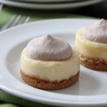 Mini Baileys Cheesecakes with Chocolate Whipped Cream Recipe - bakedbyrachel.com